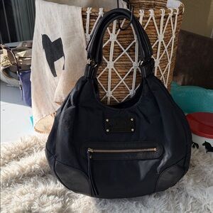 Kate Spade Black Hobo Bag with Gold Accents